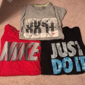 Three Nike shirts